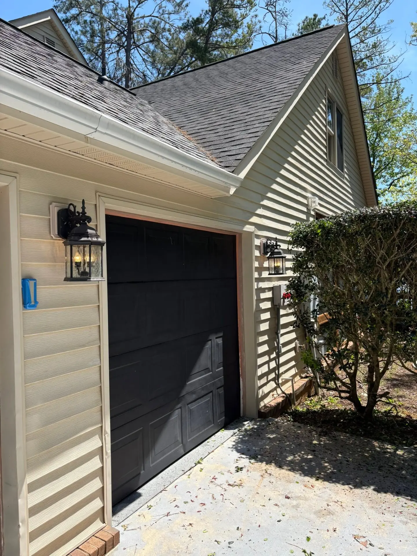 Garage, Eaves & Soffits — drag to compare — after cleaning by FloPro Pressure Cleaning